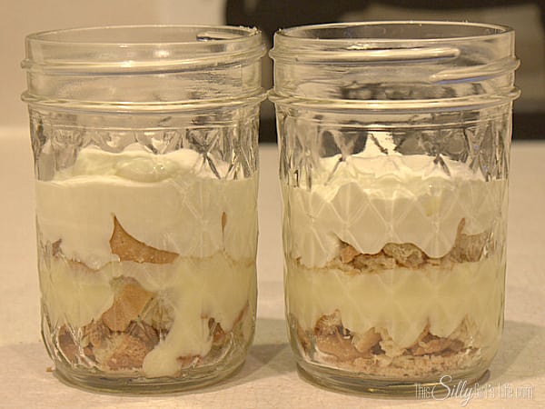 Add another layer of cookies and the banana pudding/whipped topping mixture.